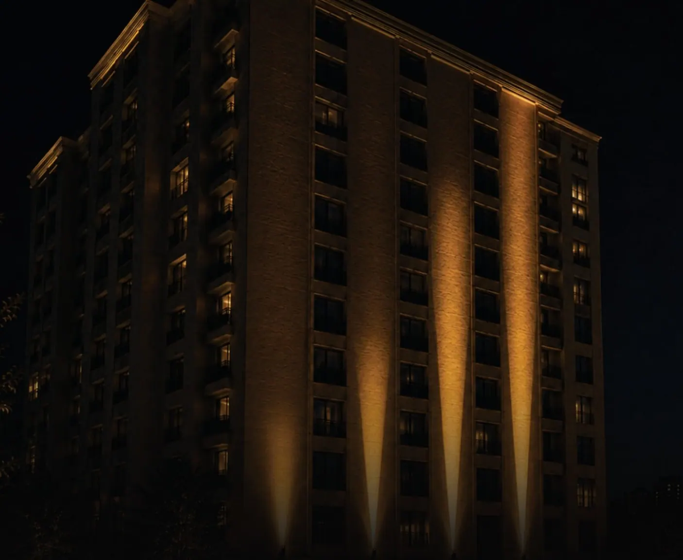Residential tower lit with vertical façade beams